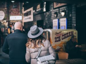 people, couple, man, woman, back, walking, city, bag, hat, shopping, male, female, dating