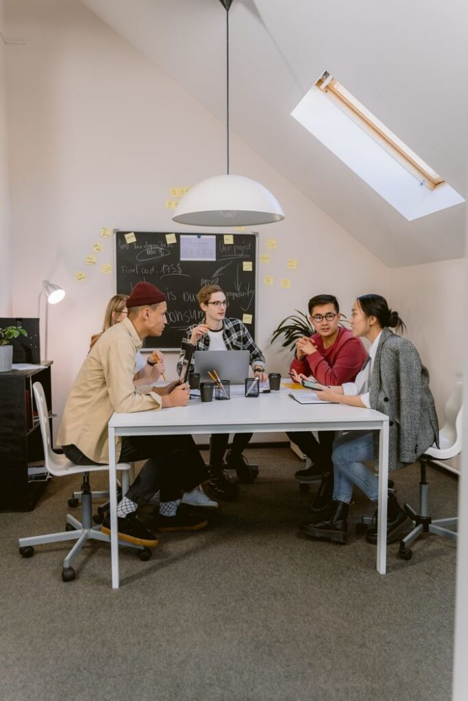 Small business team working together at an office table